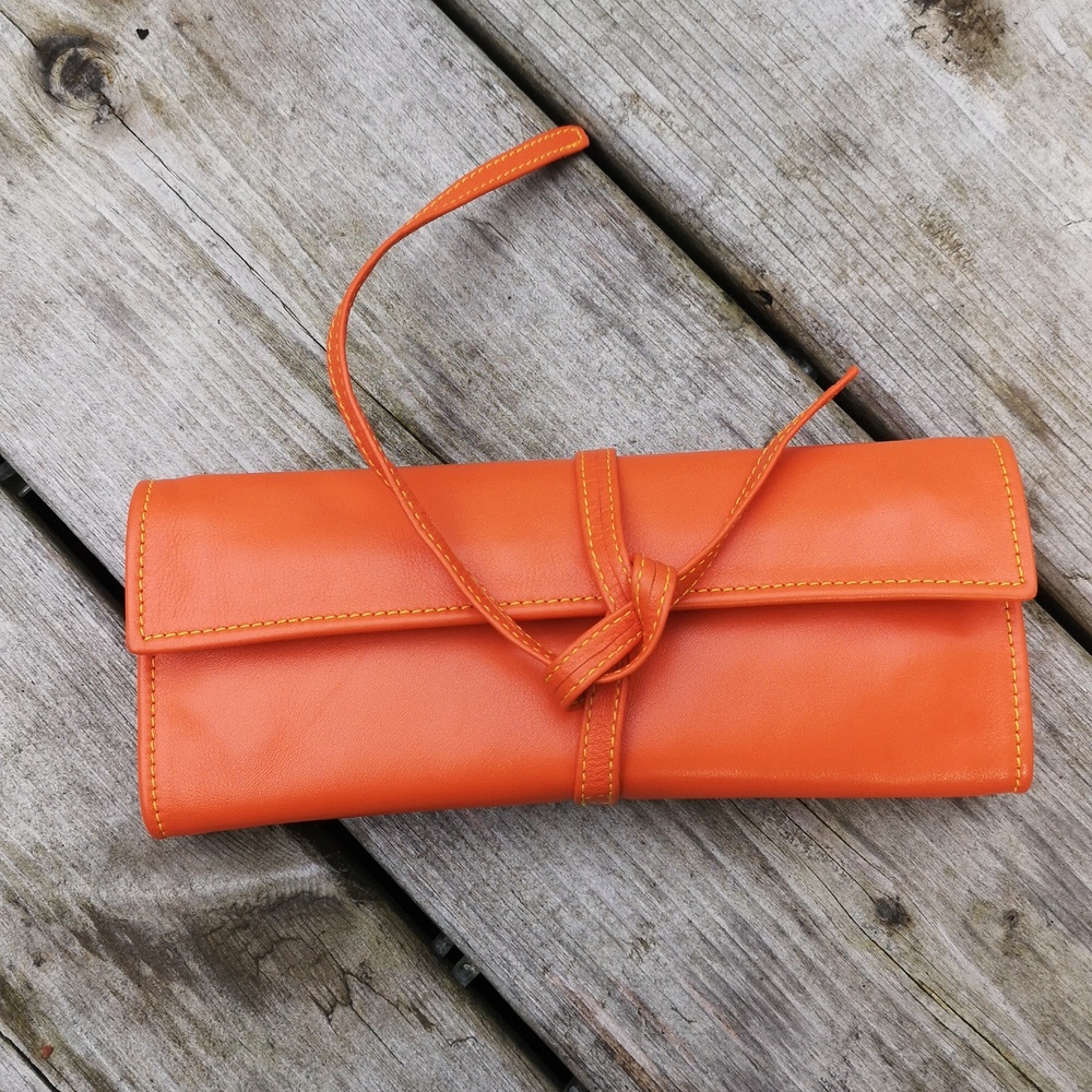 Orange leather jewelry travel case